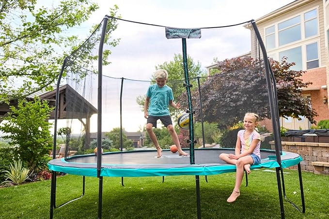SKYWALKER TRAMPOLINES 12 FT 15 FT Round Trampoline with Safety Enclosure Net, 9 x 15 FT Rectangle