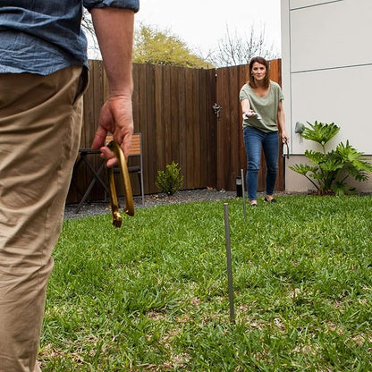 Champion Sports Horseshoe Set: Traditional Outdoor Lawn Game includes Four Professional Solid Steel