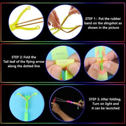 25 Packs LED Flying Toys Set with Whistle,25 Rocket Slingshot+25 Glow Arrow Helicopter for Summer